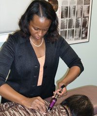 Dr. Roechelle Smith using The Activator Method Chiropractic Technique®